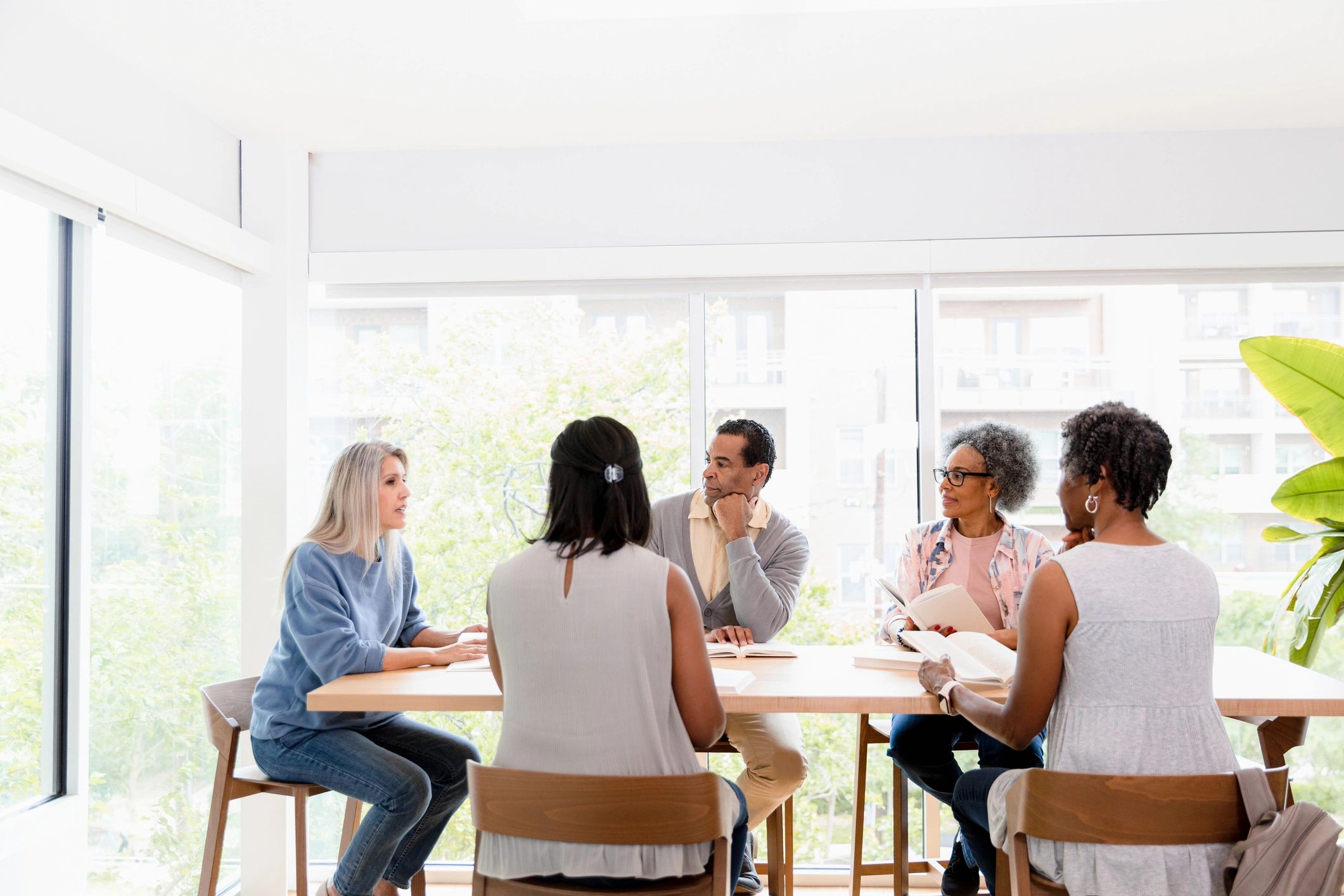 Community members in discussion at an advocacy meeting